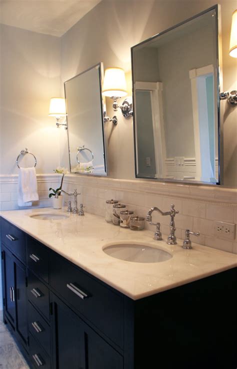 The most obvious and common place to put your bathroom mirror is above your vanity. 60" double vanity- what to do with mirrors and lighting