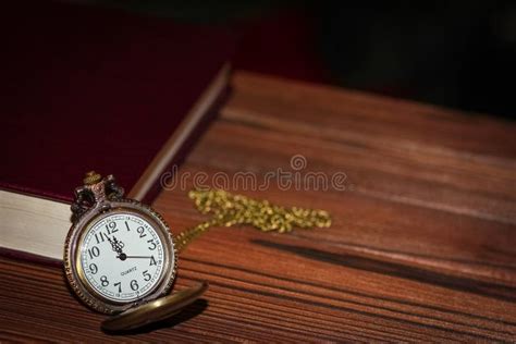 A Pocket Watch With Book Background Stock Photo Image Of Antique