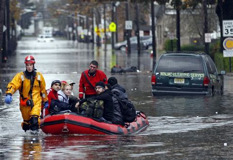 Photos Of People Rescued From Hurricane Sandy Firefighters Brave The