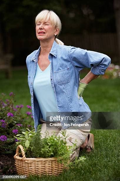 Mature Woman Kneeling Photos And Premium High Res Pictures Getty Images