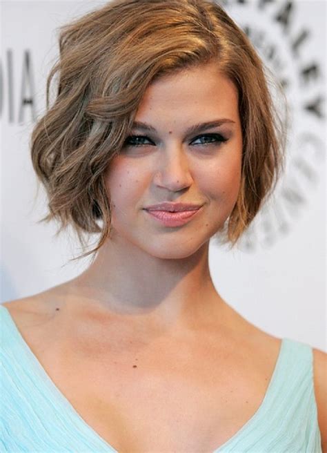 The mid part also helps balance the face shape by creating the illusion this very short, layered bob haircut is a classic shape modernized by a strong, chippy fringe. Top 10 Short Haircuts For Fall 2014 - Top Inspired