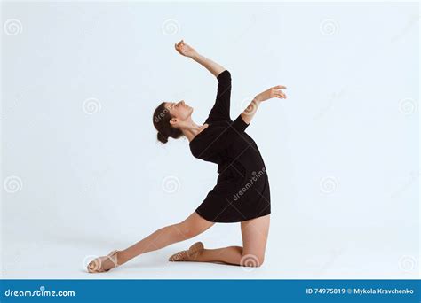 Young Beautiful Contemporary Dancer Posing Over White Background Copy