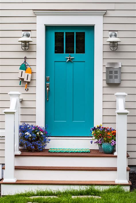 Porch with turquoise door and windows. SoPo Cottage | House of Turquoise