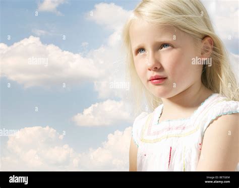 Girl Looking Up With Sky Background Stock Photo Alamy
