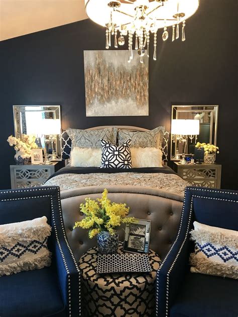 Instagram user collingwood_home decorated their beautiful tree with big black stars and black and it's not exactly gold and not exactly silver. Yellow Door Interior: Navy and Grey Master Bedroom Decor ...
