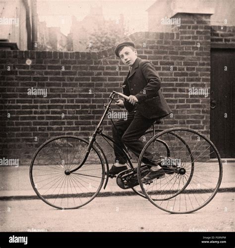 Young Lad On An Early Tricycle 1890 Stock Photo Alamy