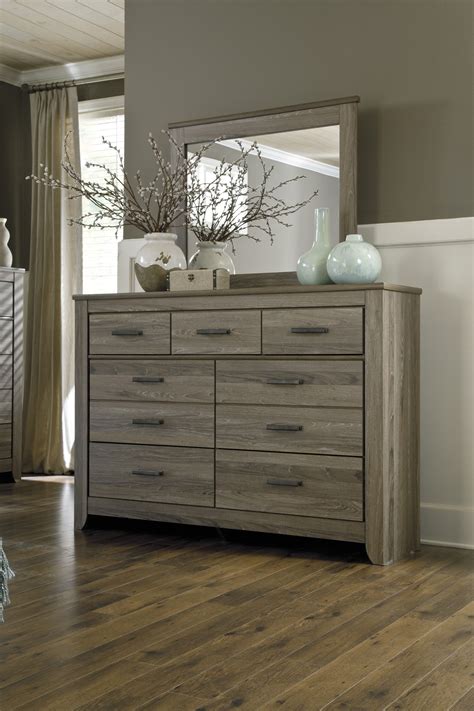 Tall generously scaled cases with wide pilaster. Signature Design by Ashley Zelen Warm Gray Dresser B248-31 ...