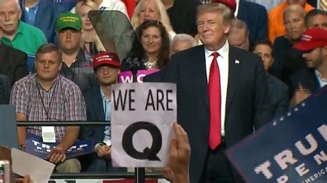 Conspiracy Theory Group Qanon Appears At Trump Rally Cnn Video