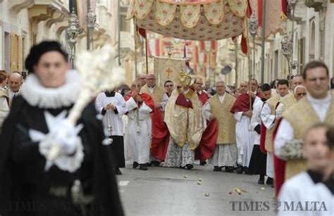The Corpus Christi Procession Makes Its Way Through The Streets Or