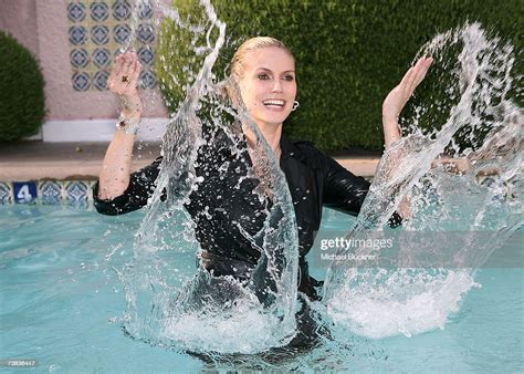 Heidi Klum Poses In The Pool To Promote Her New Qvc Collection At The