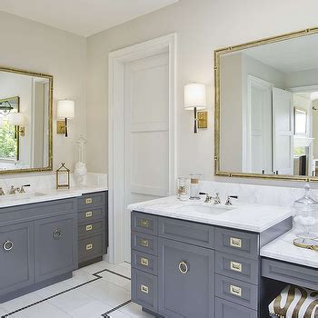 You can easily create a bathroom with a midcentury modern feel as well. Grey Bathroom Vanity with Gold Knobs - Transitional - Bathroom
