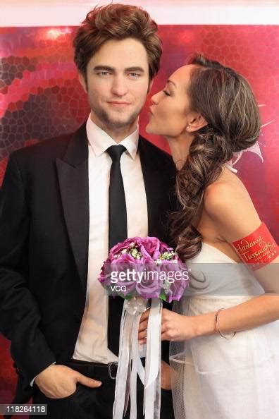 Hong Kong Model Jessica C Poses Alongside A New Robert Pattinson Wax