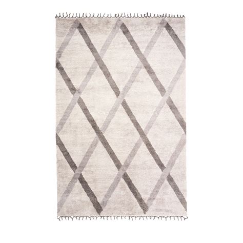 This Hand Knotted Rug By Giuseppe Manzoni Features A Design Inspired By