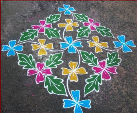 A simple floral petal central design surrounded by some flowers and leaves. புதிய புள்ளி கோலங்கள் 2021..! pulli kolangal 2021..!