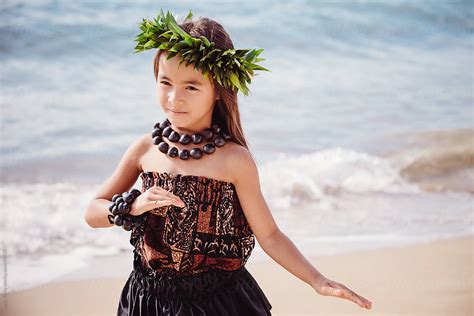 Young Girl Traditional Hawaiian Hula Dancer Performing On The Beach By Shelly Perry Stocksy United