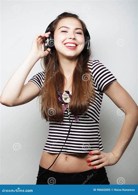 Woman With Headphones Listening Music Music Girl Dancing Agains Stock