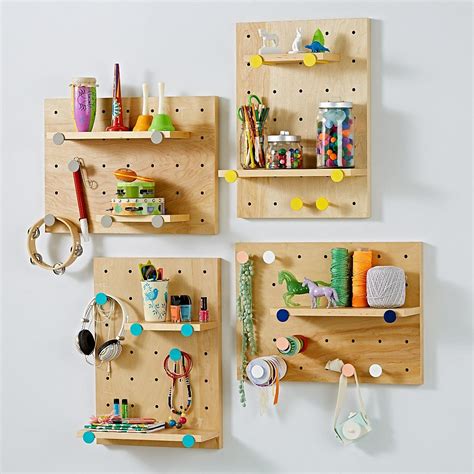 On The Pegboard Shelving System Pegboard Storage Peg Board Shelves