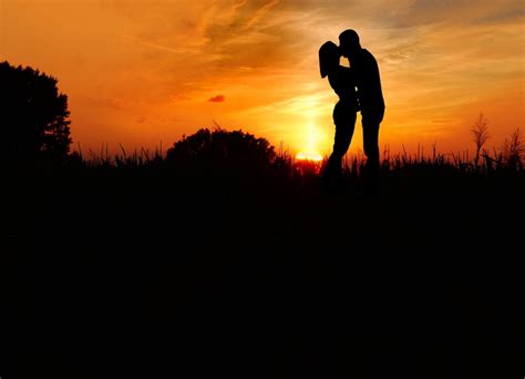 Real People Silhouette Couple Kissing Adult Together Lifestyles