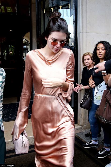 Braless Kendall Jenner Shows Off Her Nipple Piercing In A Pink Satin Gown In Paris Daily Mail