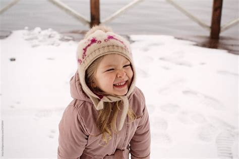 Cute Little Girl Is Laughing By Irina Ozhigova