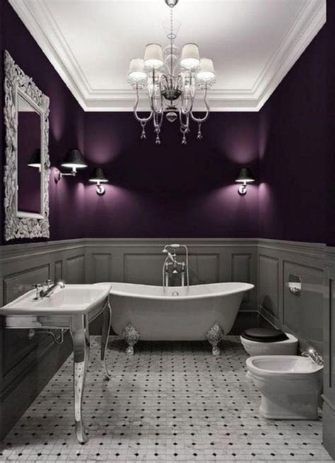 While all the walls are purple, the black and white tub (which is awesome) along with black and white floors balance out nicely. 39+ Elegant Black White Bathroom Design Ideas #bathroomideas #bathroomdecor #bathroomremodel # ...