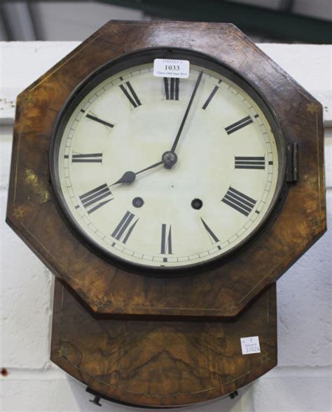 A Late 19th Century Burr Walnut Cased Drop Dial Wall Clock With Eight Day Movement Striking On A Gon