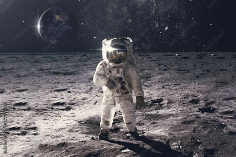 Astronaut On Rock Surface With Space Background Elements Of This Image