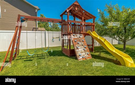 Panorama Frame Wooden Playground Structure With Yellow Plastic Slide