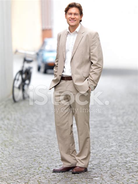 Businessman Standing On The Road Stock Photo Royalty Free Freeimages