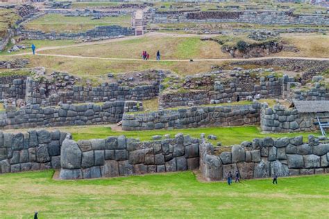 Tourists Visit Inca`s Ruins Of Sacsaywaman Near Cuzco Editorial Stock