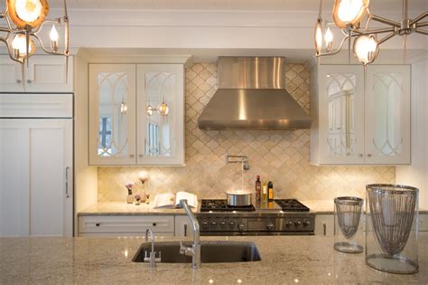 Whether you choose prefinished kitchen cabinets or unfinished kitchen cabinets, we have all of full kitchen remodels or builds require more than just new cabinets. Classy Kitchen With Mirrored Cabinets | HGTV