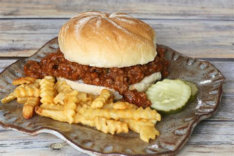 Loose meat sandwiches are flavorful midwestern chopped meat burgers made with seasoned beef, worcestershire sauce and onion, topped with dill for a traditional loose meat sandwich, simply spoon your seasoned ground beef mixture on a bottom hamburger bun, top with thick dill pickles and. Ground Beef and Sausage Team up in These Sloppy Joe ...