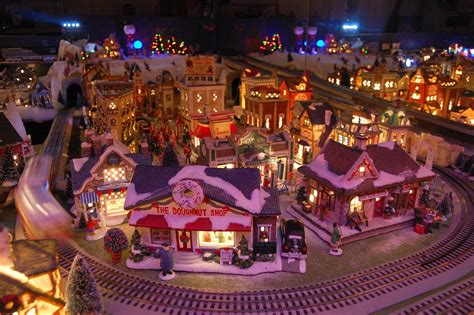 Our Yearly Christmas Village. Lionel train, trolley, 150 houses make up
