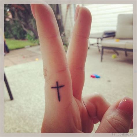 49 Creative Cross Tattoos On Fingers Tattoo Designs