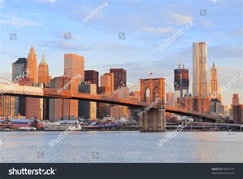 Brooklyn Bridge With Lower Manhattan Skyline In The Morning With