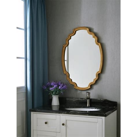 It instantly highlights any space with its beautiful frame molding made of polystyrene. Kenroy Home Backstage Oval Gold Vanity Wall Mirror-60227MG ...