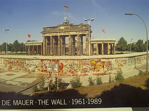 The berlin wall was a concrete barrier that divided the city from 1961 to 1989. The Berlin Wall in front of the Brandenburg Gate, about ...