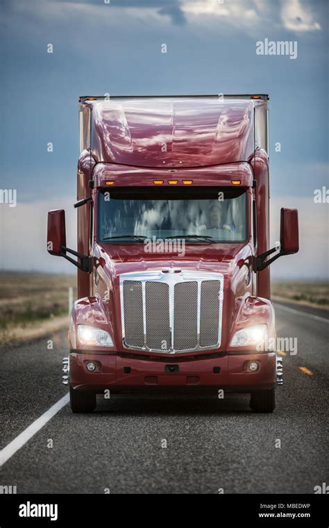 Front View Of The Cab Of A Commercial Truck On The Hiighway Stock Photo