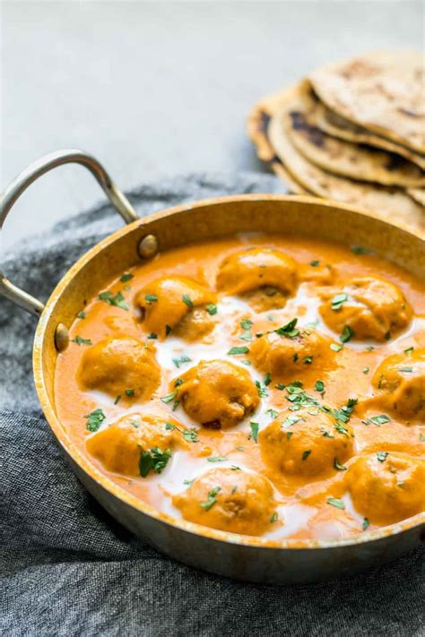 vegan malai kofta indian dumplings in curry tomato cream sauce the curious chickpea