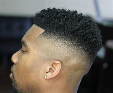 The barber keeps his hair long and very well combed on. Pin on "BLACK MEN HAIRCUTS"