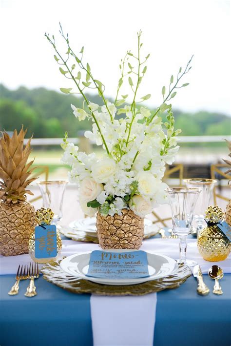 This Centerpiece Is Made With Real Pineapples That Were Spray Painted Gold And Stuffed With Real