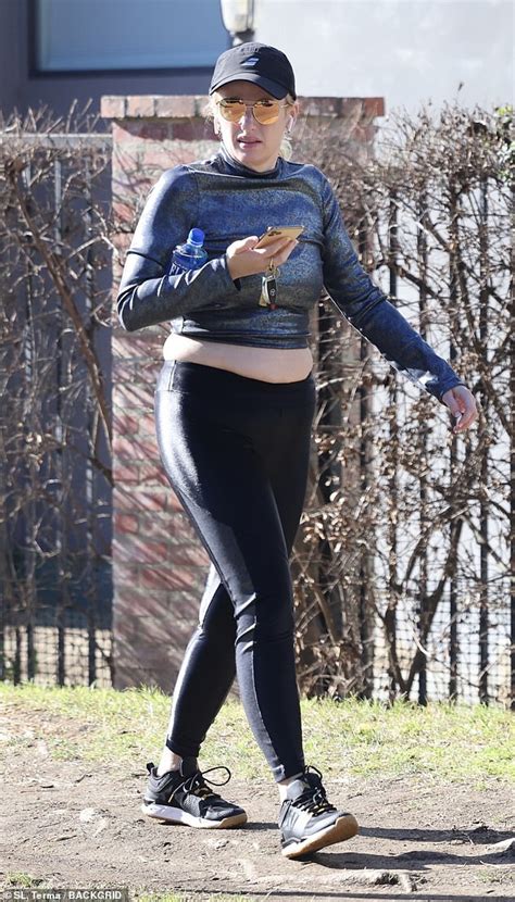 Rebel Wilson Shows Off Her Bare Stomach In A Crop Top And Tight