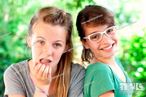Teenage Girls Wearing Glasses And Dental Braces Stock Photo Picture