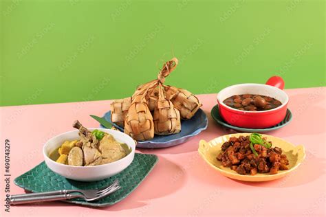 Ketupat Sayur Typical Lebaran Served With Rendang Opor Ayam Begana Buncis And Sambal Goreng
