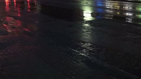 Slow Motion Silhouette Of Pedestrians Walking On Rainy