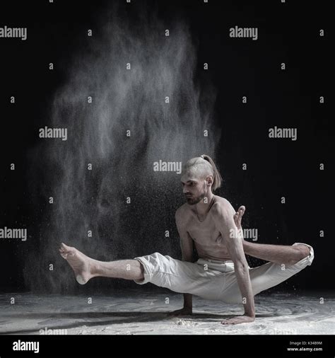 Flexible Yoga Man Doing Hand Balance Asana Brahmachariasana Stock Photo