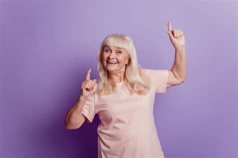 Attractive Mature Grey Haired Lady Dancing On Purple Background Euran Naisvoimistelijat Ry