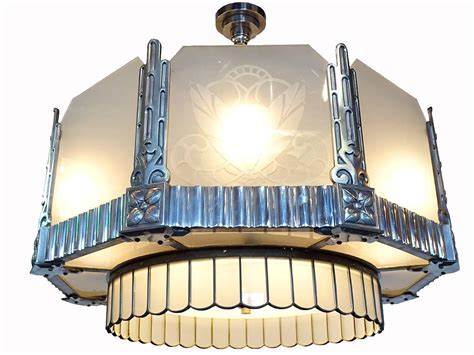 The glass bulb cover is also textured, giving it a unique visual appeal that works well with other vintage decor styles. Art Deco Theater Chandelier and Matching Ceiling Fans at ...
