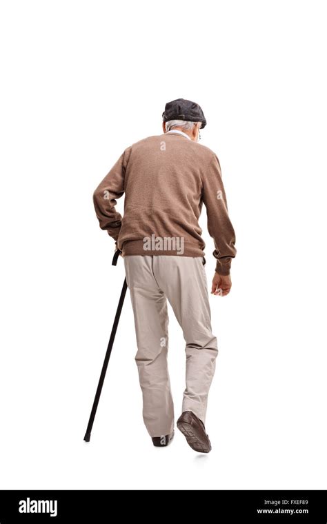 Rear View Vertical Shot Of An Old Man Walking With A Black Cane Isolated On White Background