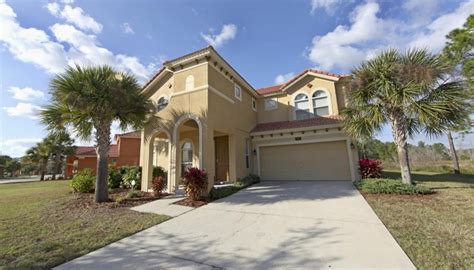 White door and red brick Exterior Paint Color Ideas for Florida | HomeSteady